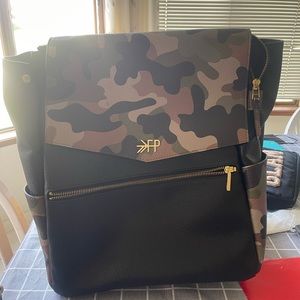 Camo classic diaper bag. Minor discoloration in some areas shown in pictures!